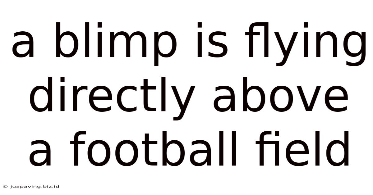 A Blimp Is Flying Directly Above A Football Field