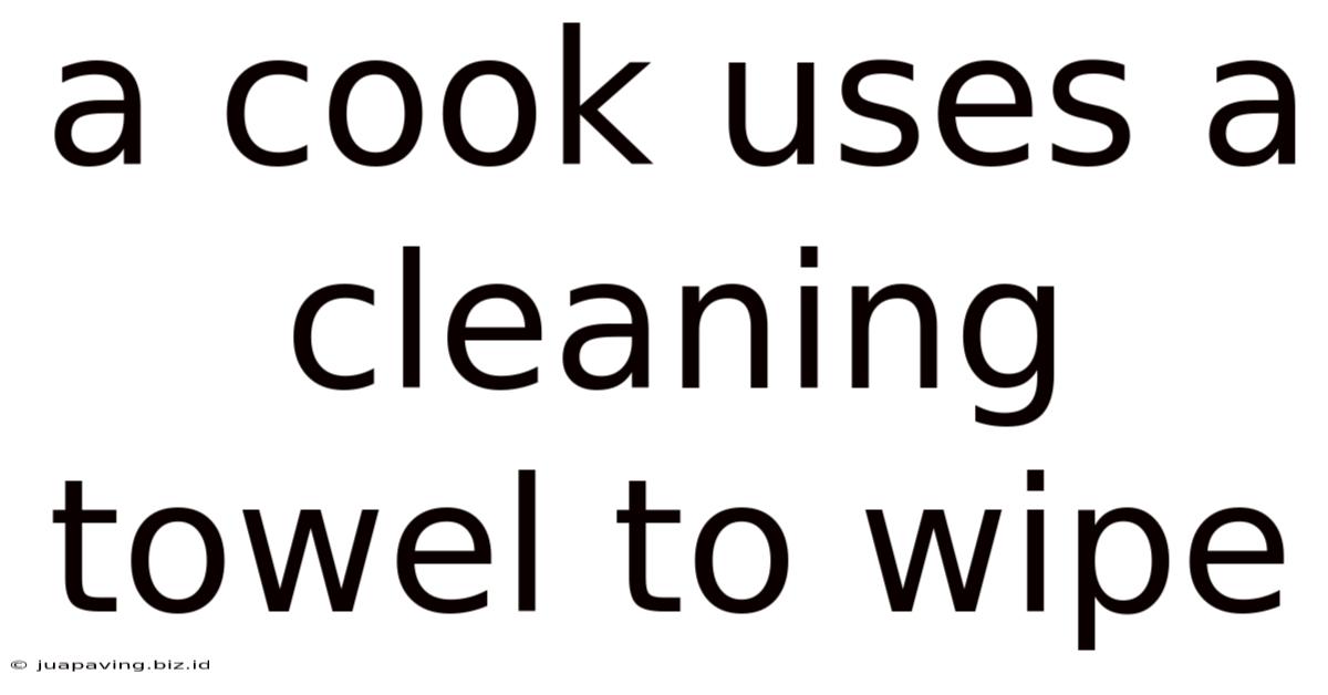 A Cook Uses A Cleaning Towel To Wipe