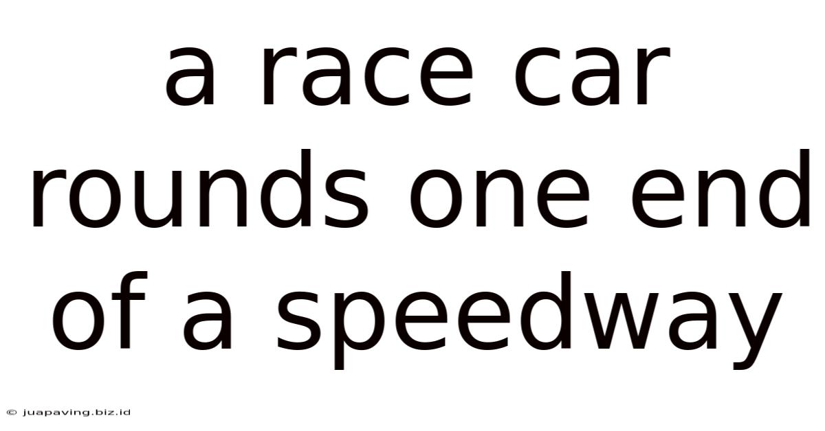 A Race Car Rounds One End Of A Speedway